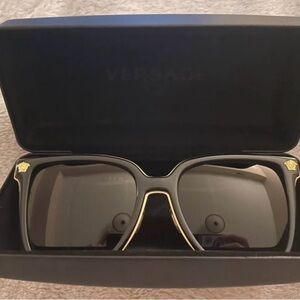 Versace Black Case with Gold Lettering